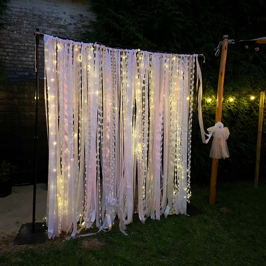 white-whisper-backdrop-photobooth